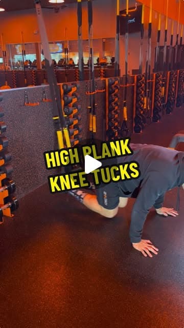 High Plank Knee Tucks on the Straps