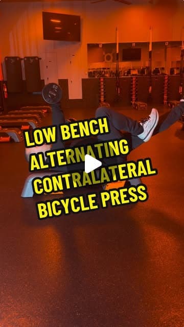 Low Bench Alternating Contralateral Bicycle Press