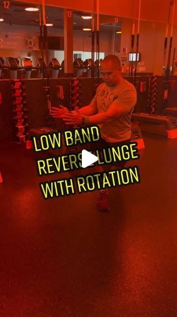 Low band reverse lunge with torso rotation