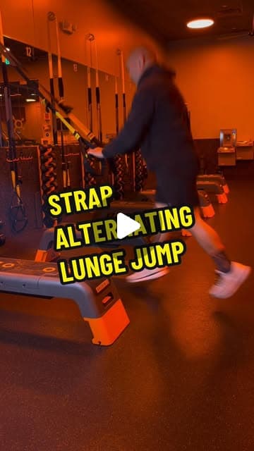 Strap alternating jump lunge