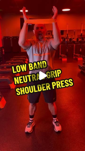 Low band neutral grip shoulder press