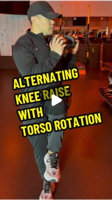 Alternating Knee Raise with Torso Rotation