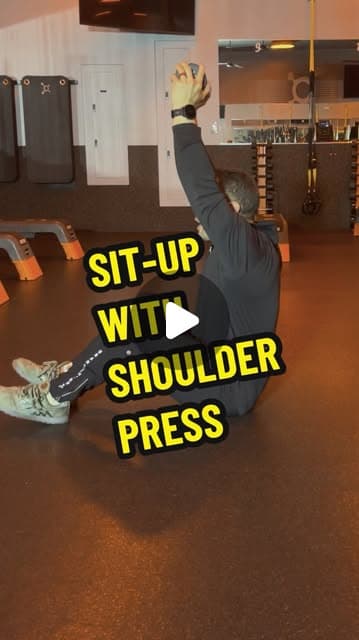 Sit-Up with Dumbbell Shoulder Press