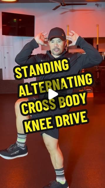 Standing Alternating Cross Body Knee Drive