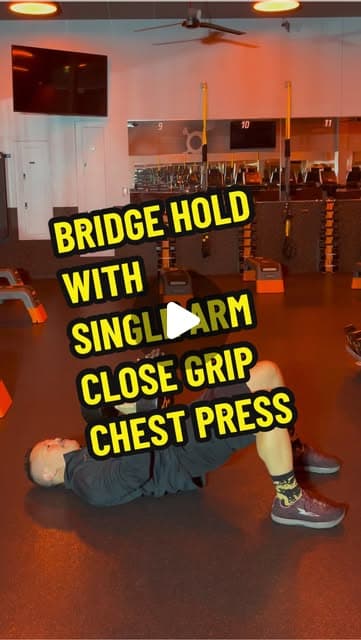 Floor Bridge Hold with Single Arm Close Grip Chest Press