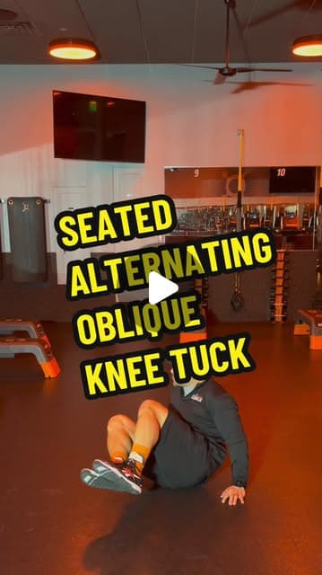 Seated Alternating Oblique Knee Tuck
